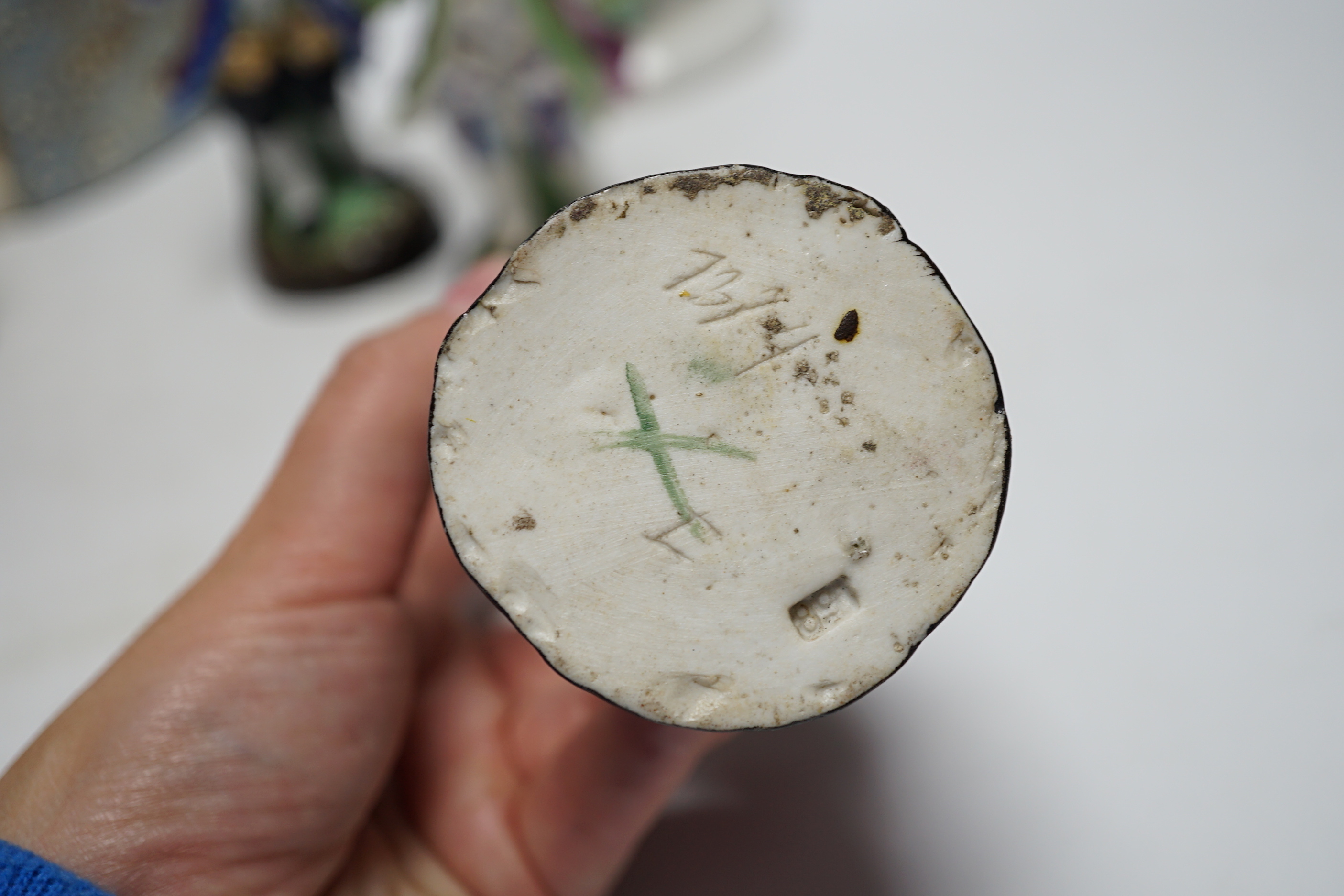 Mixed ceramics; a Madonna and child group, a jug, a pair of Sitzendorf miniature flower encrusted vases, nine small German style figures, etc. (18)